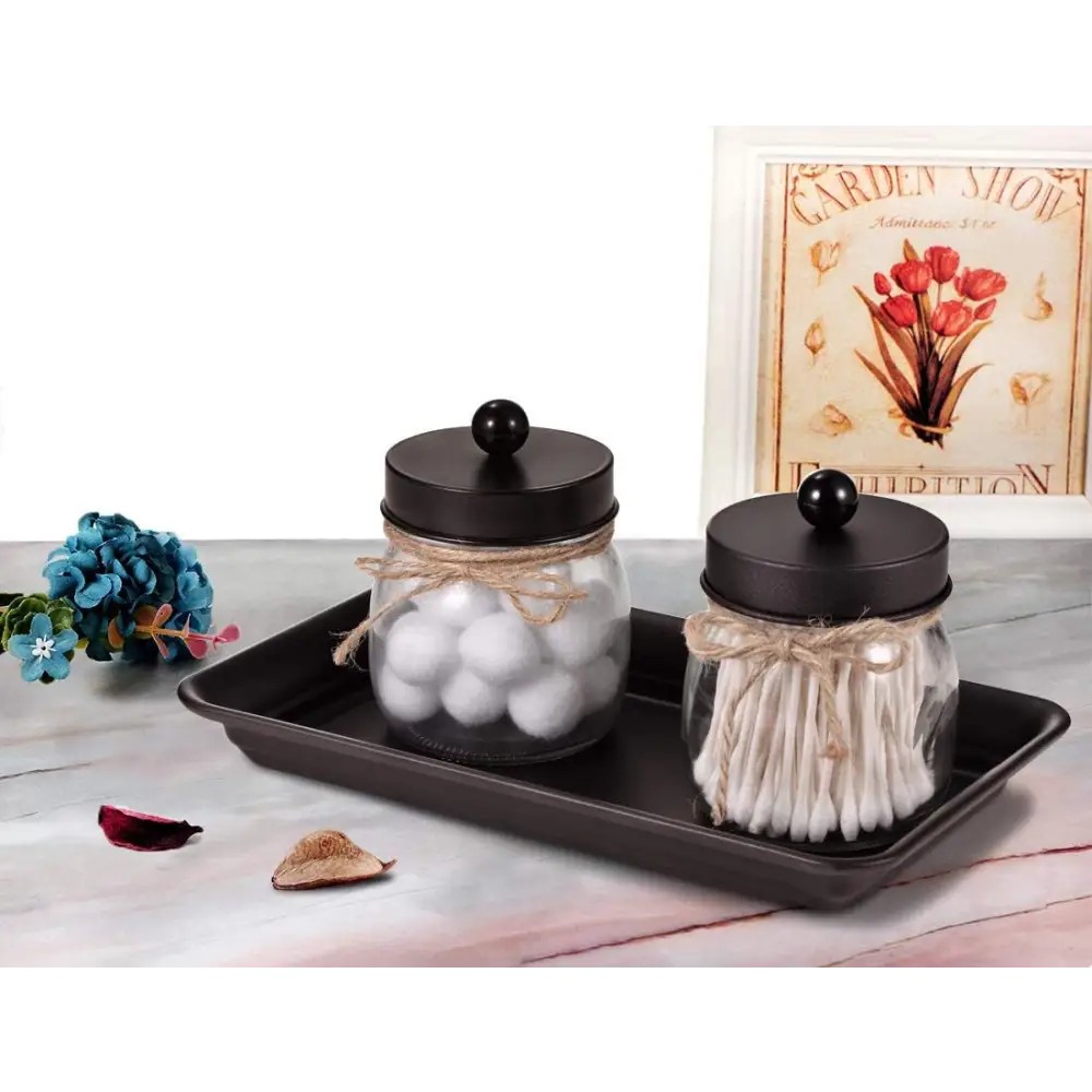 Black square tray with jars of cotton balls and swabs on rustic Brown and Gold Vanity Trays