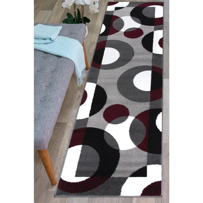 Modern geometric Circles Abstract Rug with dark red, white, and gray circles on a light background