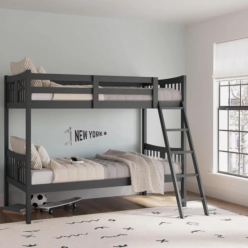 Dark gray wooden twin bunk bed with ladder and New York decals on mattress
