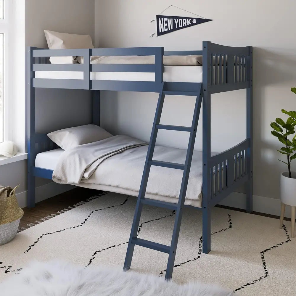 Navy blue wooden twin bunk bed with ladder and slatted design in modern style