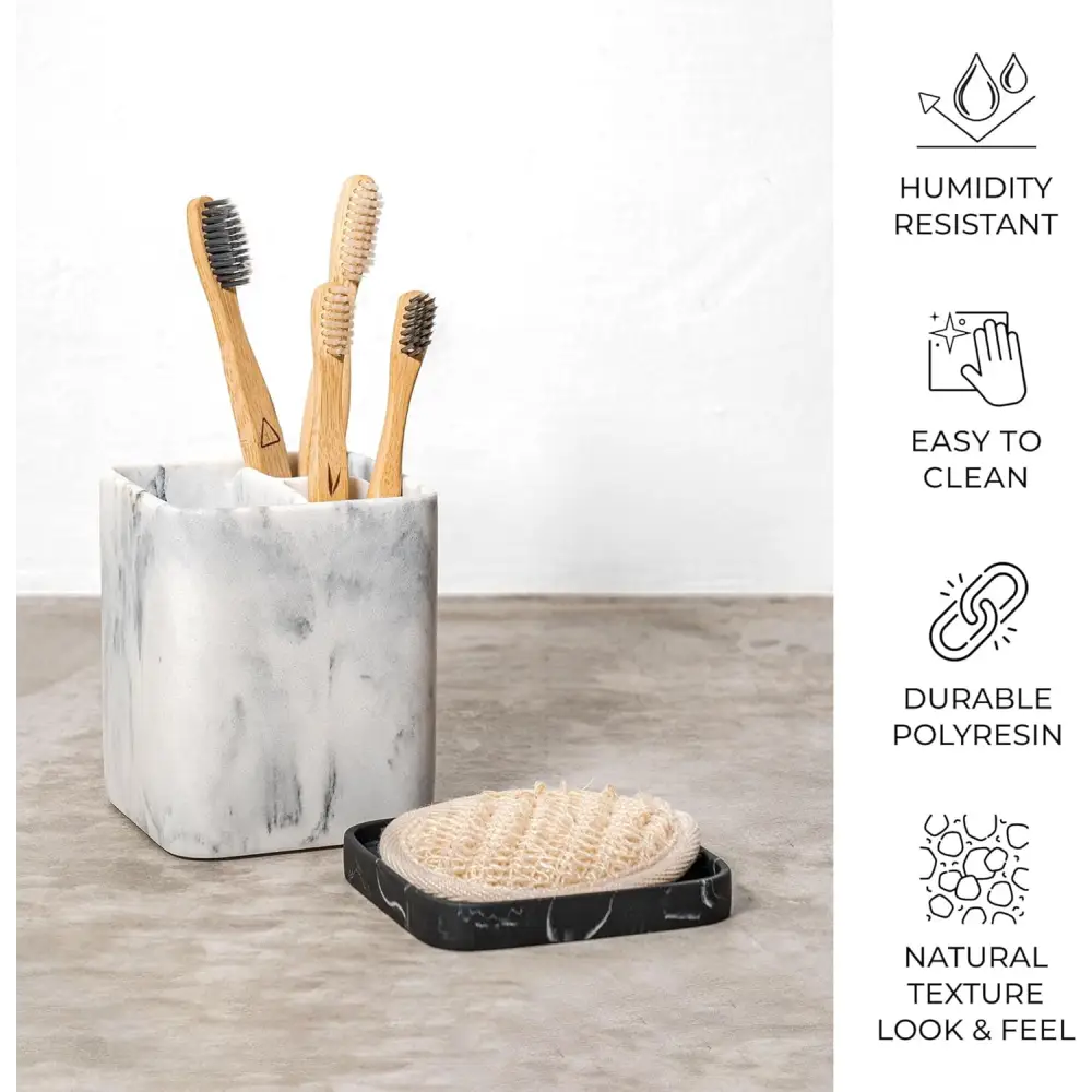 White marble toothbrush holder with black speckles made of durable polyresin material