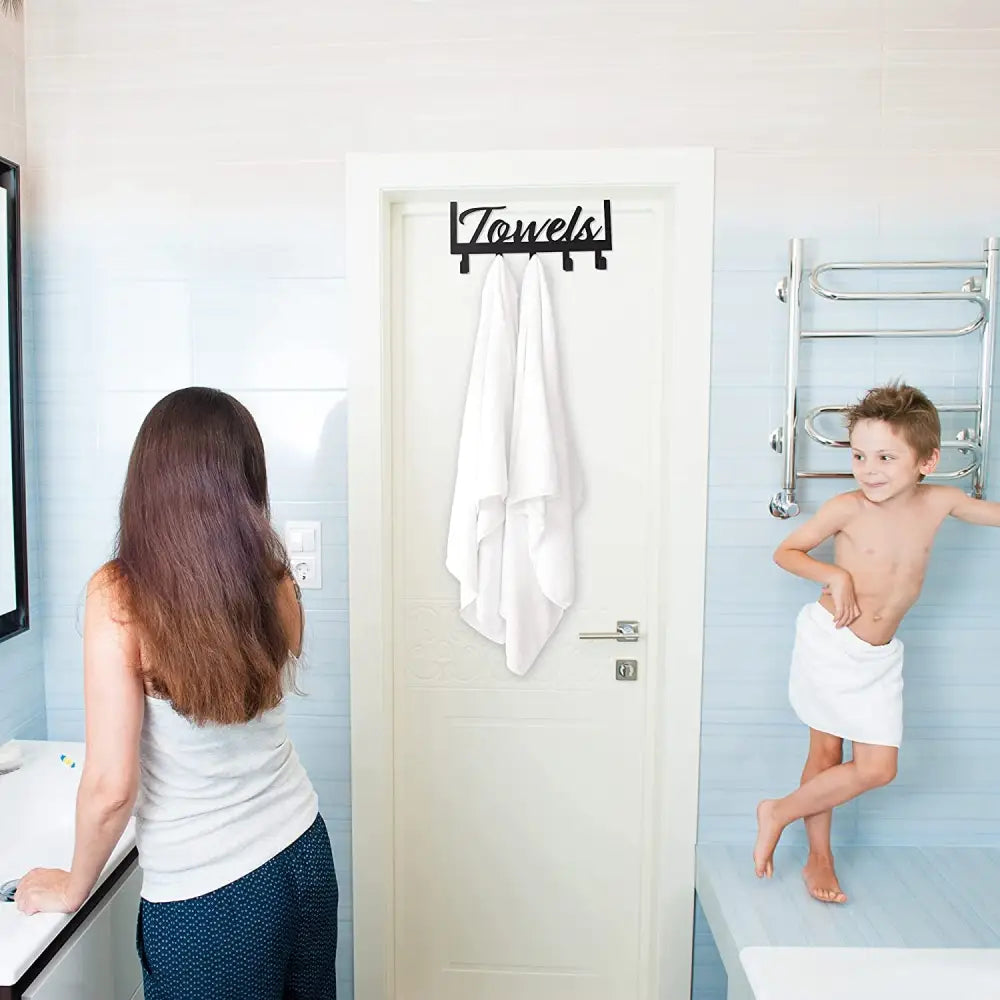 Black towel rack with towels sign for over the door bathroom organization