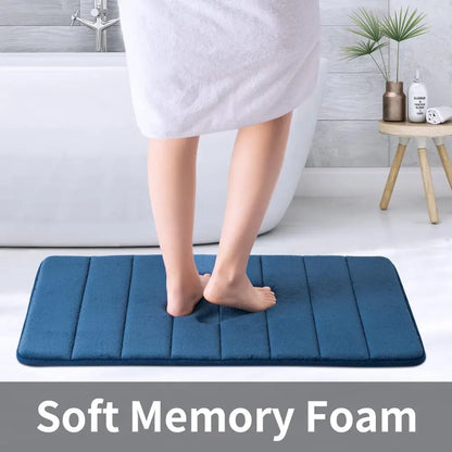 Blue ROSMARUS Navy textured memory foam bath mat with soft cushioning