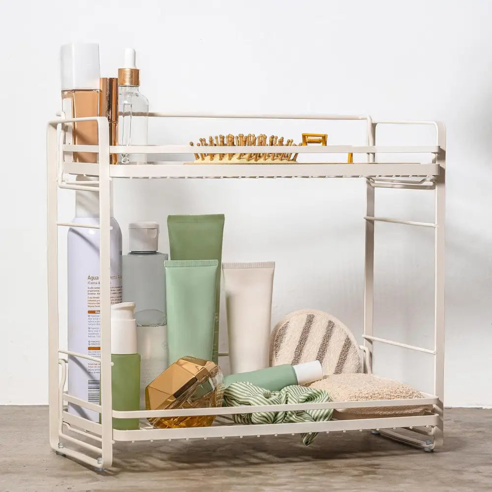 Cream-colored metal storage rack with multiple shelves for organizing toiletries and makeup