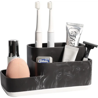 Black marble-patterned bathroom caddy holding toothbrushes and toiletries for White Marble Makeup Organizer